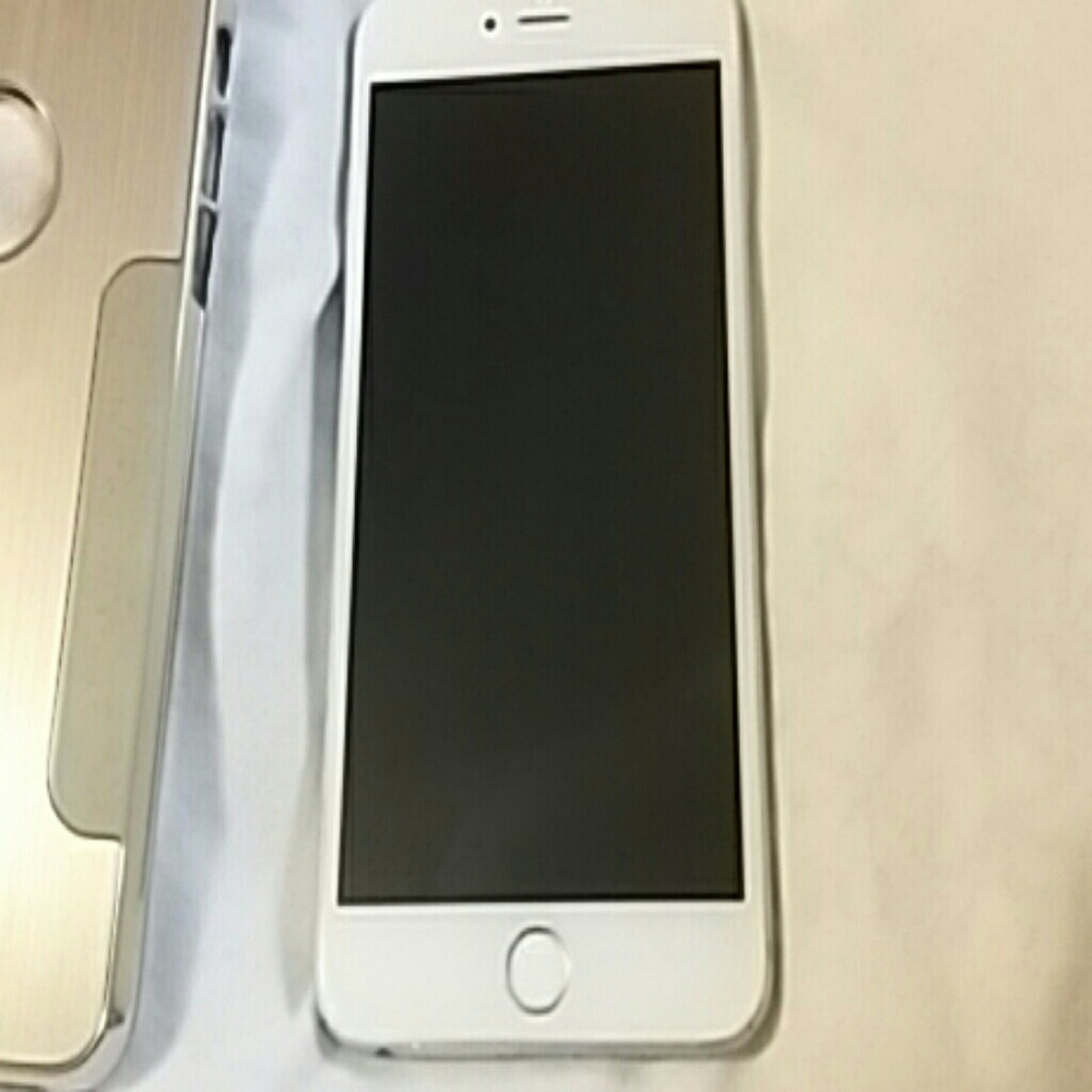 White iPhone 6s plus with case.
